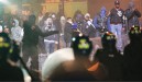 rioters face down police