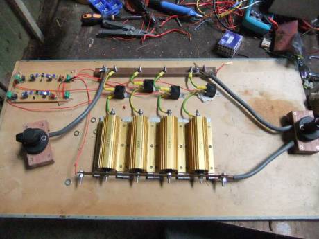 This circuit dumps excess power when batteries are full and also provides a wind turbine brake