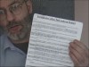 Mick Murphy with the leaflet given to the GAMA workers