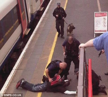 He was the wrong man. Innocent. Walked out of the station and is alive.