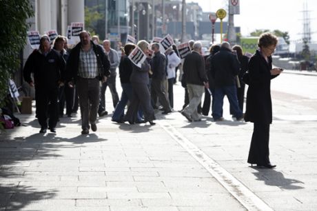 The Principal Officer from the Department in foreground trying to negotiate a way round