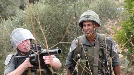 IOF soldier about to fire at Nabi Saleh protest