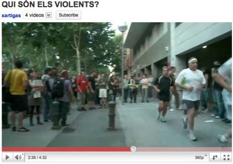 These "protestors" gather in a garageway and are encircled by protestors who chant "secret police" <!-- (for above)-->