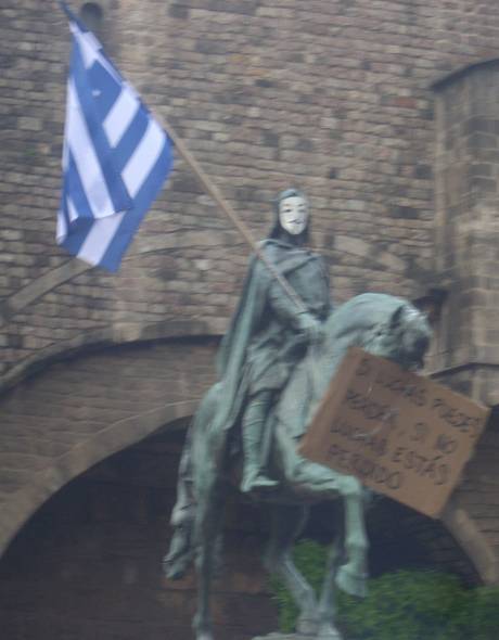 old king ramon at Barcelona's roman walls calls on Europe's serfs to rise up.