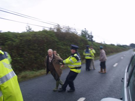 Garda being rough with an elderly man